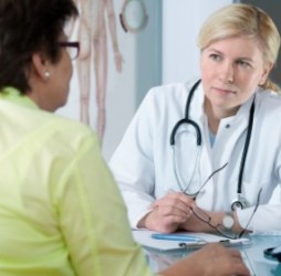 Doctor listening to patient